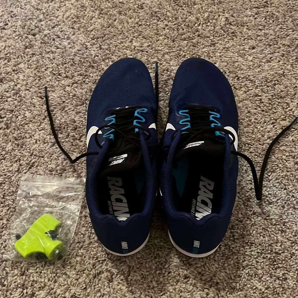 Nike track cleats. Brand new never worn. Navy blue. Men’s 12.
